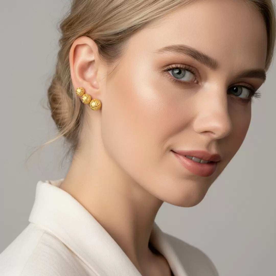 Brinco trio de esferas